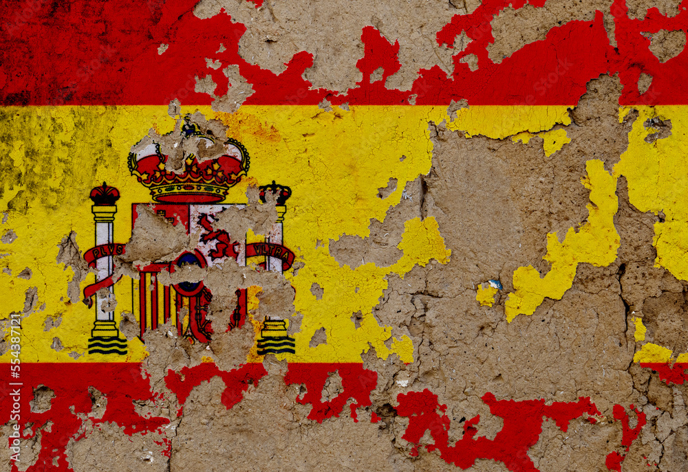 Fototapeta premium Spanish flag on mud wall