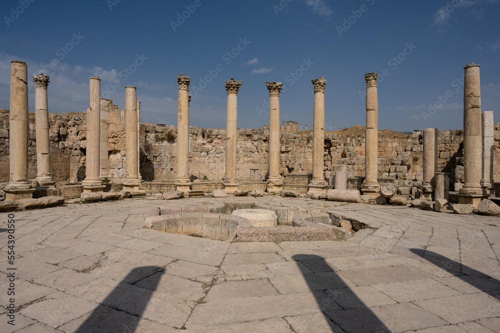 Agora, the Ancient Market Square of Gerasa with Corinthian Columns in Jerash, Jordan with the Central Fountain of the Macellum