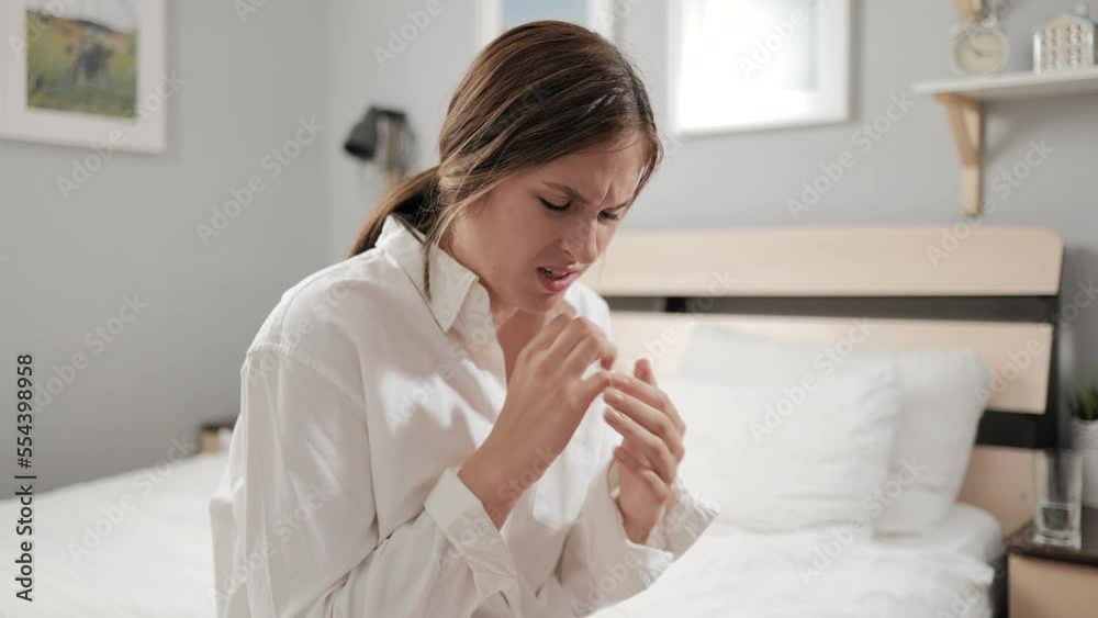 Pain in fingers. Young attractive woman suffering from finger pain. Inflammation, arthritis, gout in fingers Pain in fingers. Young attractive woman suffering from finger pain. Inflammation, arthritis, gout in fingers