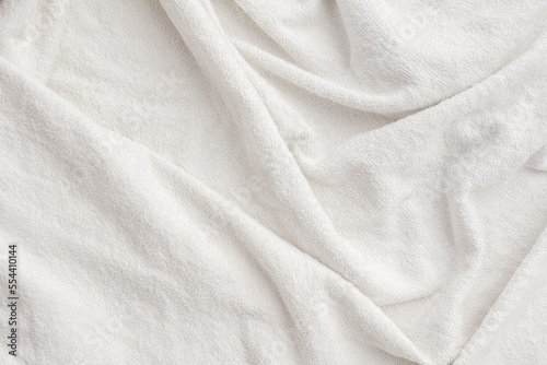 фотографія Close-up of unevenness of off-white colored pile towels