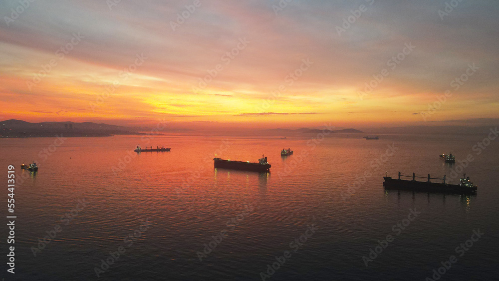aerial view of cargo ships  before sunrise in sea of marmara