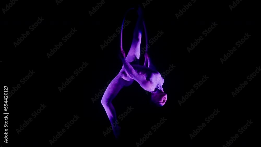Woman Doing A Back Balance Split In A Hoop Woman Doing A Back Balance Split In A Hoop