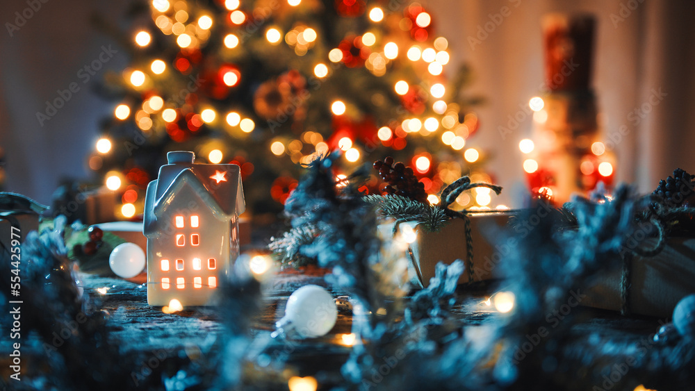 The little house with candle and tree as background The little house with candle and tree as background