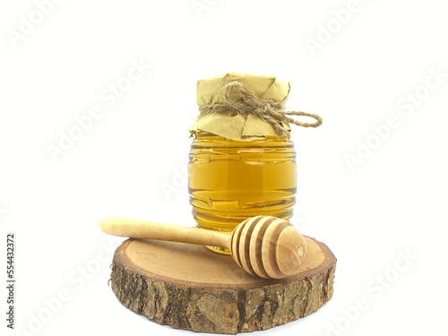 Vintage Old Honey Bee Bottle Packaging Design Ideas, Dipper and wood spoon, pure natural wild honey issues, health benefits for cancer, diabetes, organic acids and enzymes