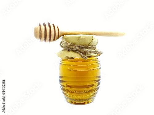 Vintage Old Honey Bee Bottle Packaging Design Ideas, Dipper and wood spoon, pure natural wild honey issues, health benefits for cancer, diabetes, organic acids and enzymes
