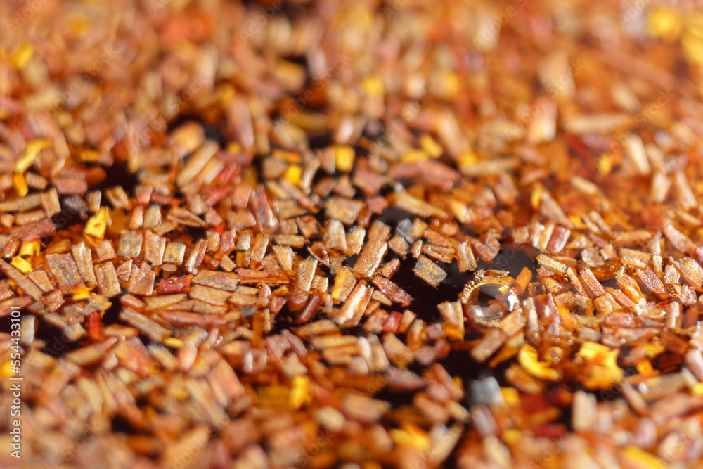 Brews Rooibos close up, a traditional drink in South Africa. Organic tea. Selective focus Brews Rooibos close up, a traditional drink in South Africa. Organic tea. Selective focus