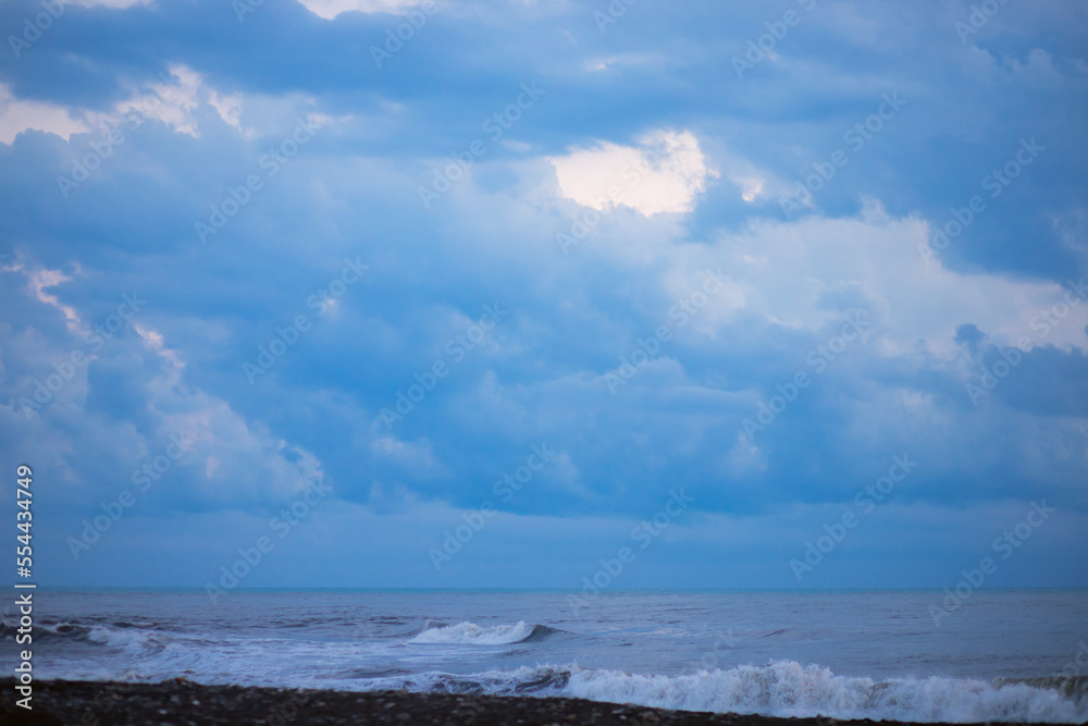 cloudy sky before a storm at sea in the evening