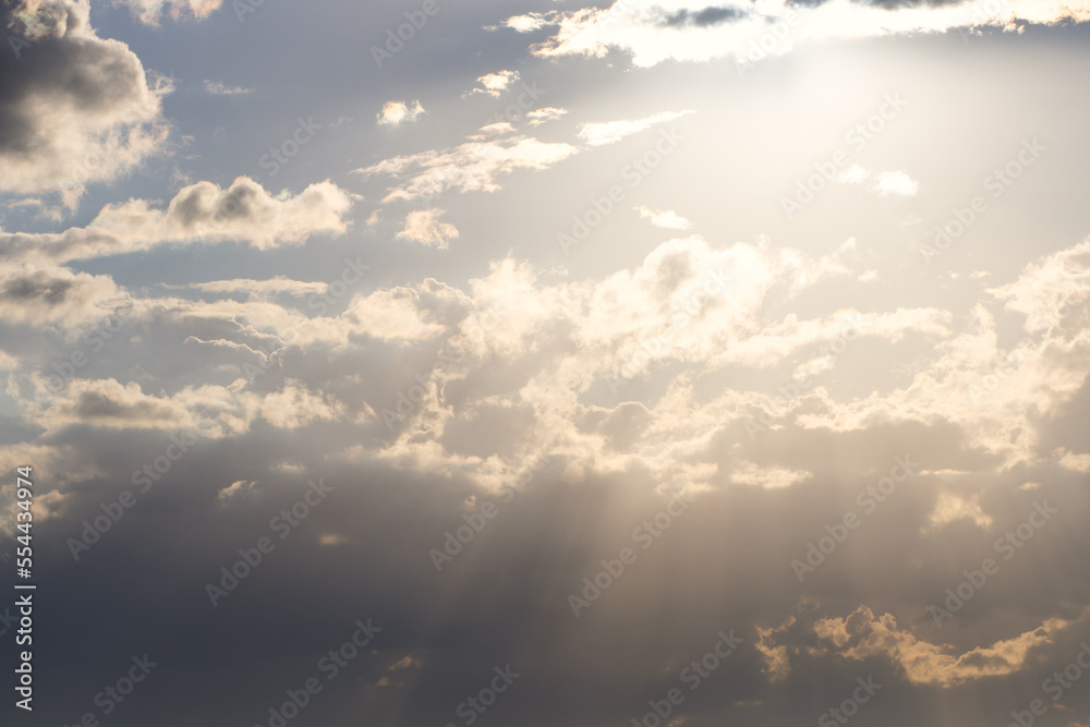 Fototapeta premium the sun's rays pass through the clouds
