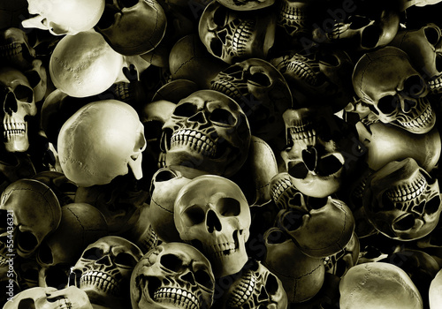 Many scary human skulls as background. Collage design