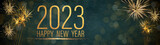 Happy New Year 2023 Party Silvester background banner panorama long- Golden yellow firework on green texture