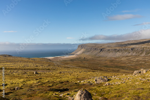 Raudasandur beach or Red Sands beach is a beautiful red beach in a very remote area in the Westfjords of Iceland photo