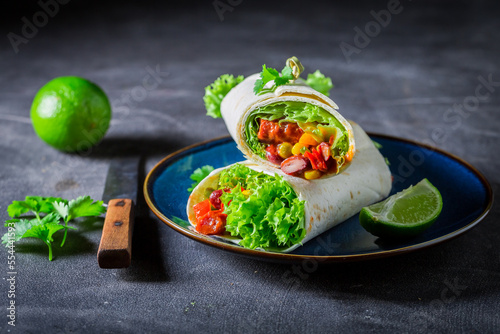 Tasty and spicy burrito wit...