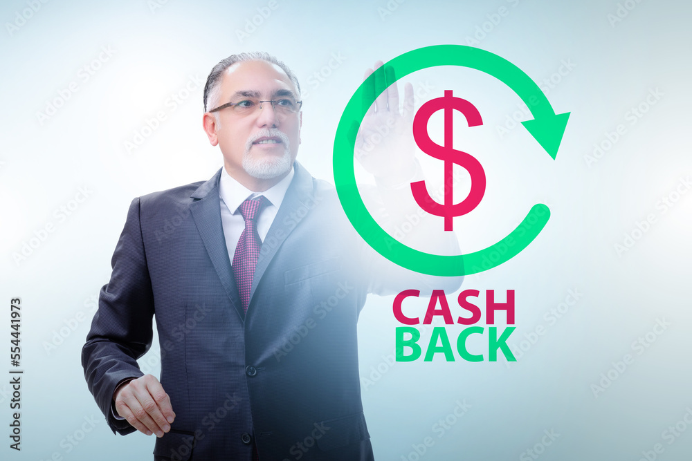 Businessman in the cash back concept Businessman in the cash back concept