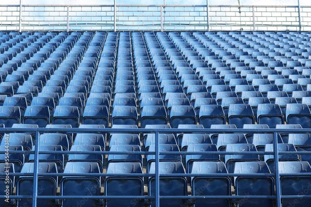 Fototapeta premium Empty blue stadium seats pattern.