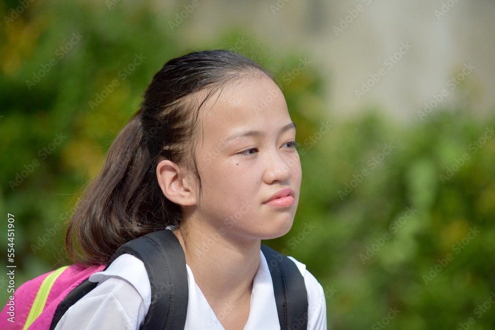 Unhappy Minority School Girl With School Books