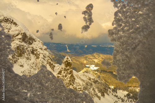 Fototapeta Naklejka Na Ścianę i Meble -  Tatar mountains through snow-covered window