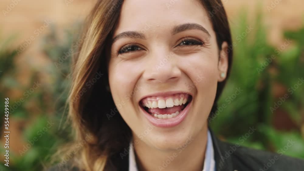 Face, woman and laughing for comic attitude while happy, funny and showing teeth against green plant blurred background. Portrait of college student with scholarship and positive mindset for freedom Face, woman and laughing for comic attitude while happy, funny and showing teeth against green plant blurred background. Portrait of college student with scholarship and positive mindset for freedom