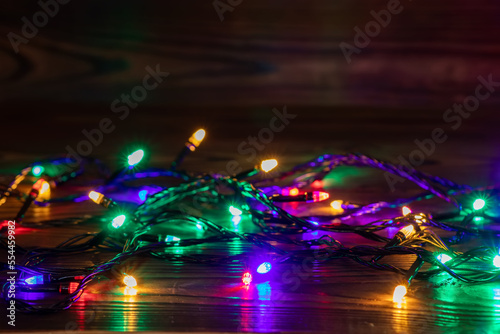 Christmas background with lights and free text space. Christmas lights border.