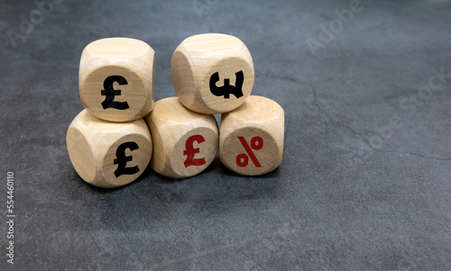 pound Word Written on Wooden Cubes