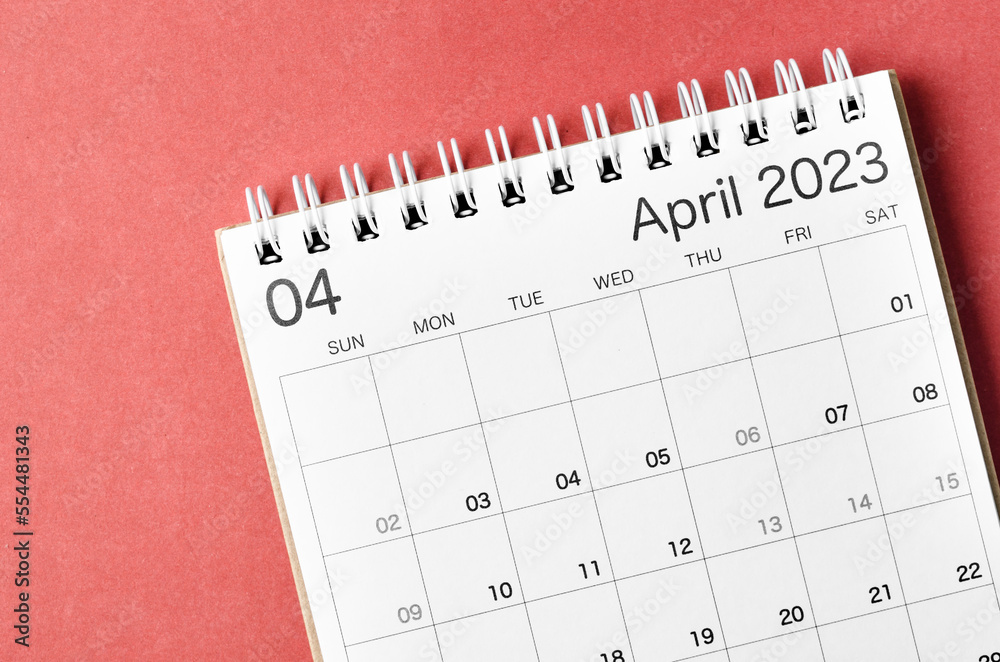 A April 2023 calendar desk for the organizer to plan and reminder isolated on red background. A April 2023 calendar desk for the organizer to plan and reminder isolated on red background.