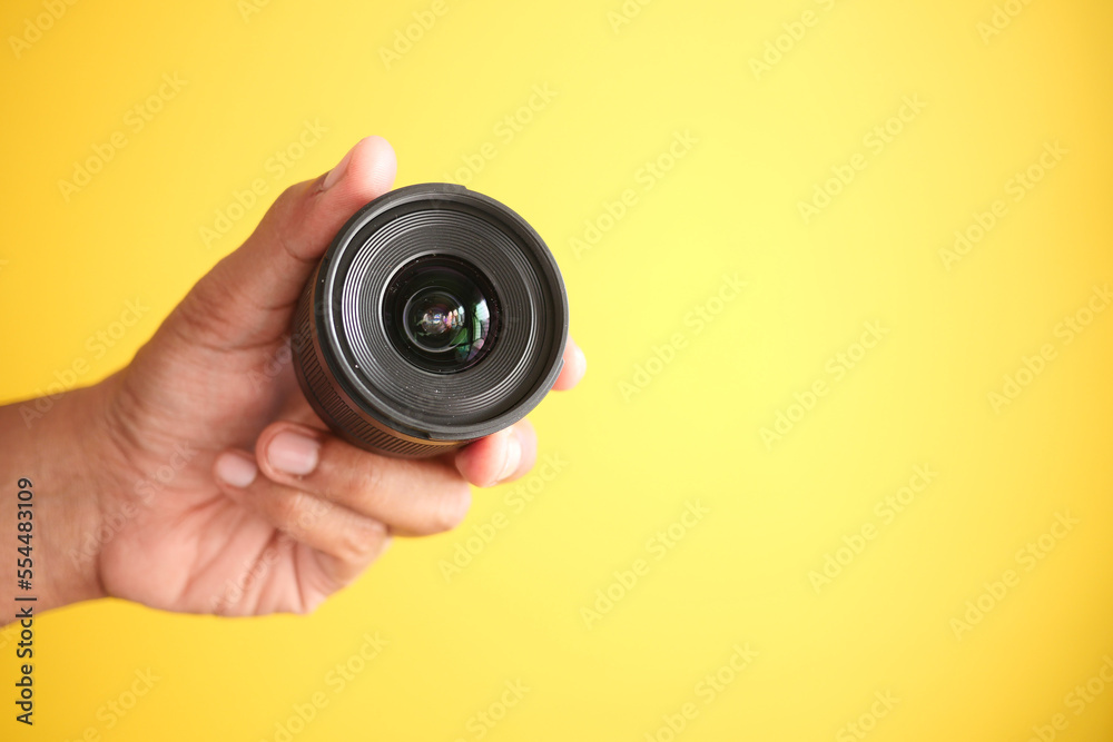 top view of holding a camera lenses top view of holding a camera lenses
