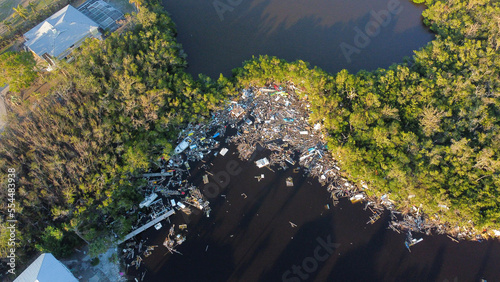 Εκτύπωση καμβά Piles of debris sit in the water of Estero Bay following Hurricane Ian