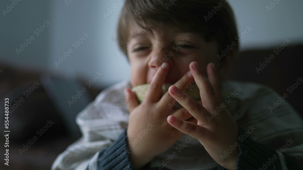 Child finishing melon fruit. Small boy eating fruit dessert. Kid eats healthy snack Child finishing melon fruit. Small boy eating fruit dessert. Kid eats healthy snack