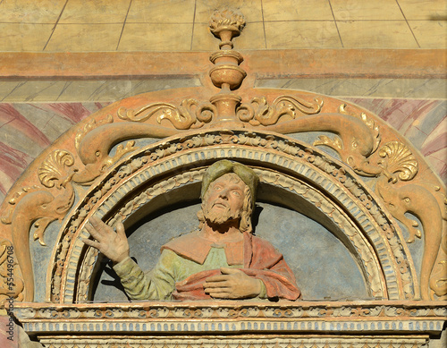Detail of the decorated entrance portal to the Cathedral of Santa Maria Assunta of Aosta comes from the V-XIX century, the Valley of Aosta, north of Italy