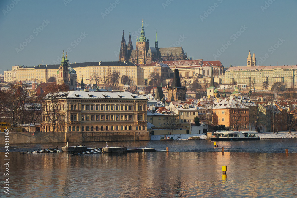 View over Vltava river to Charles bridge, Prague Castle in background.