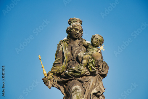 Statue of the Madonna attending to St. Bernard on Charles bridge  Prague. Czech Republic.