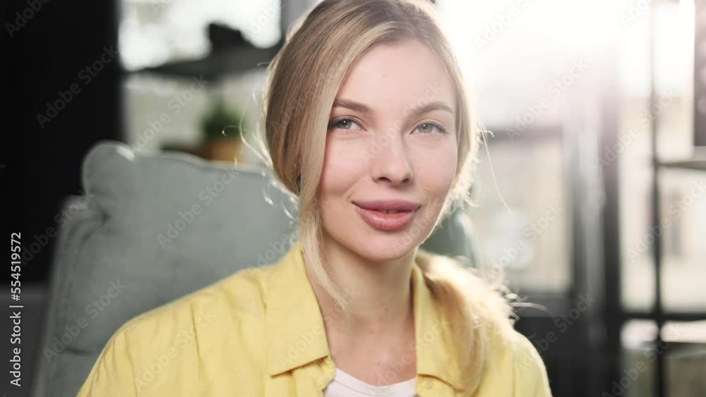 Close up portrait of successful blond businesswoman employee looking at the camera in the light office Smiling young office worker in the sunny workplace indoors Close up portrait of successful blond businesswoman employee looking at the camera in the light office Smiling young office worker in the sunny workplace indoors
