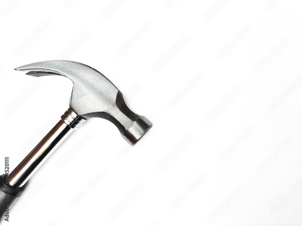 Hammer isolated on white background. Hammer and nail puller, two in one. Close up of a Hammer with a rubberized handle. Hammer isolated on white background. Hammer and nail puller, two in one. Close up of a Hammer with a rubberized handle.
