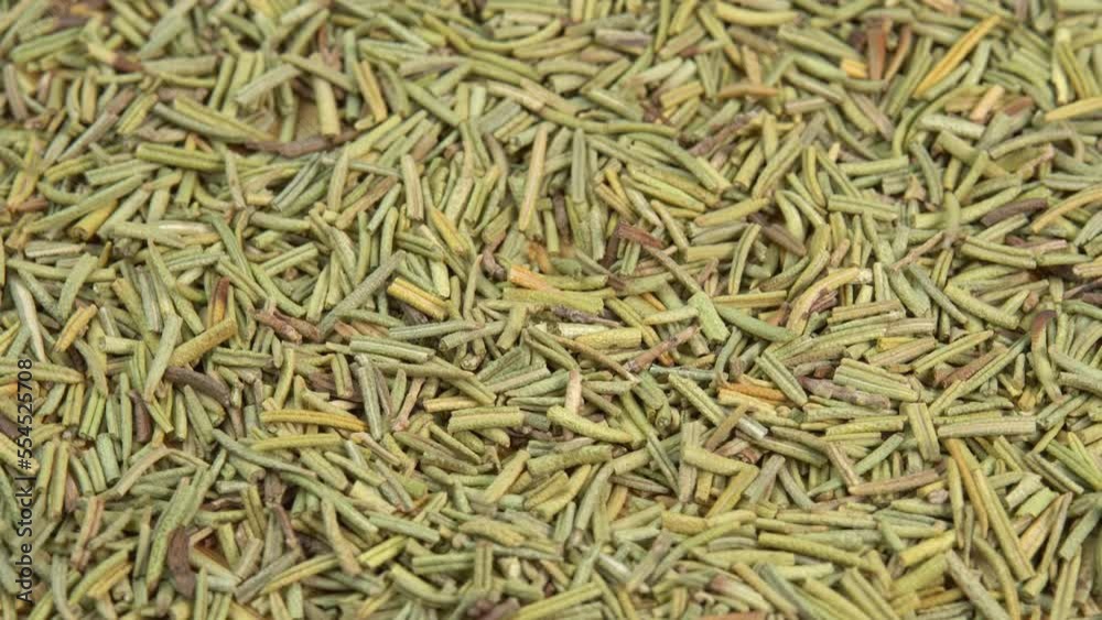 Dried rosemary spice background rotate. Dry seasoning rosemary. Spices and herbs for cooking, provence herbs Dried rosemary spice background rotate. Dry seasoning rosemary. Spices and herbs for cooking, provence herbs