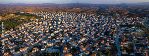 Aerial view around the city Kilkis in Greece on a late sunny afternoon. 