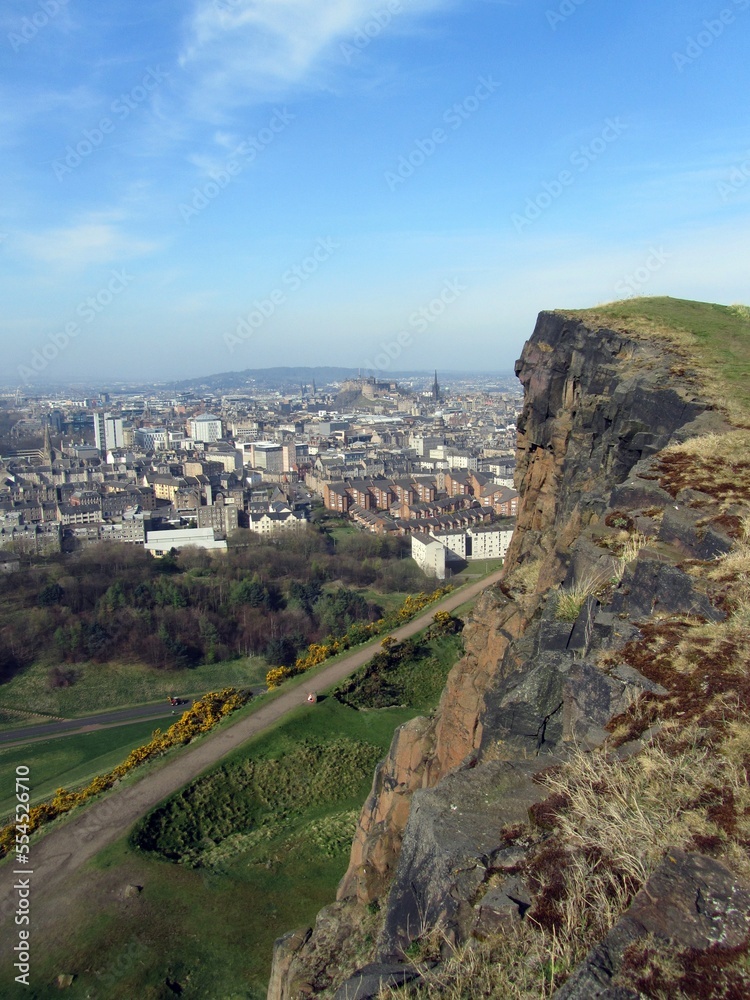 Edinburgh from Holyrood Park, with Salisbury Crags in the foreground.