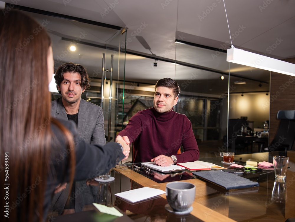 Fototapeta premium Business people shaking hands in the office