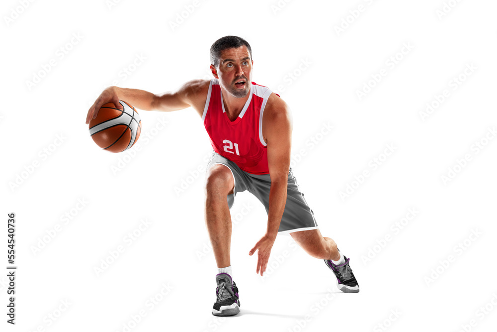 Basketball. Basketball player in motion and action. Sport emotion. Isolated in white