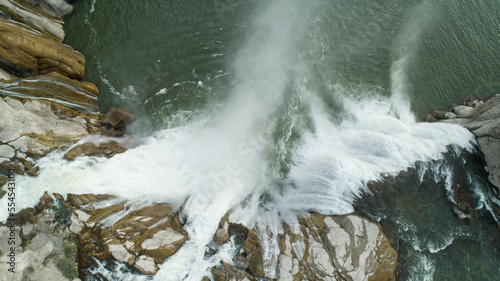 Fototapeta Naklejka Na Ścianę i Meble -  looking down at a waterfall in spring