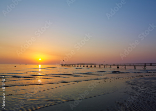 Amazing Sunset on the Sea. Adriatic sea  pier  sunset  waves and landscape.  Rimini  Italy.