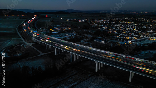 high angle view of motorway bridge going through the country at night