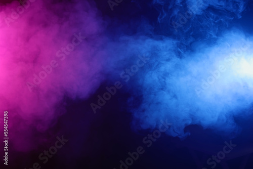 Pink and blue smoke on black background