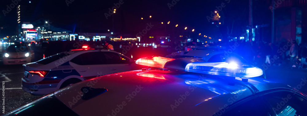Police car with flashing lights on