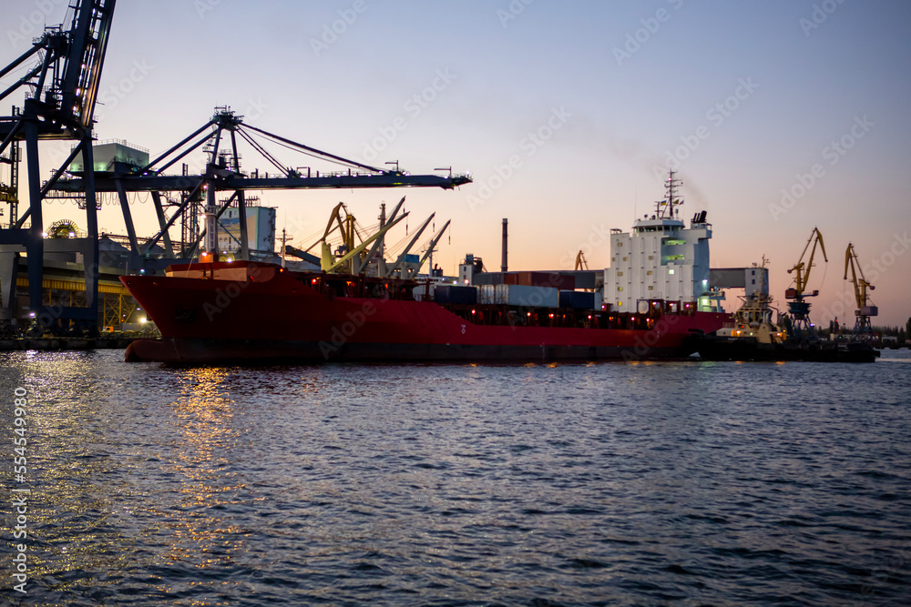 Vessel dry cargo on loading, unloading in port. Bulker in port.