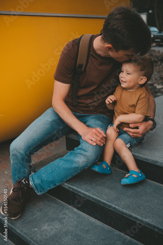 Family fun. Dad and child have a good time together. photo