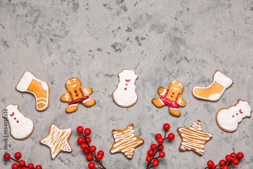 Composition with different Christmas cookies and decor on grunge background