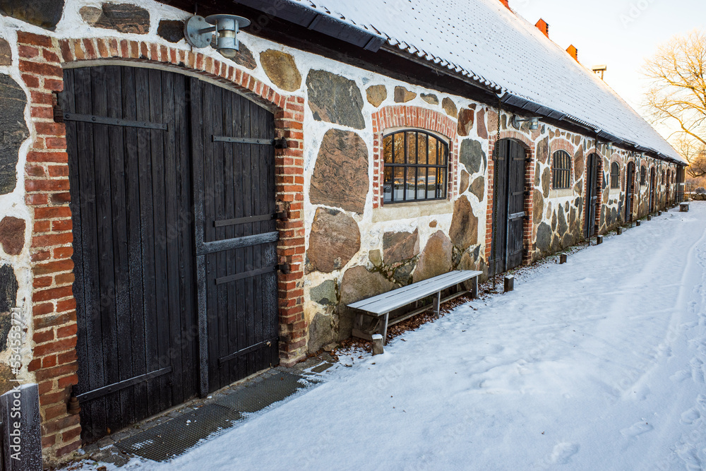 Old barn at Hovdala Slott in the winter, Hässleholm, Scania, Sweden.