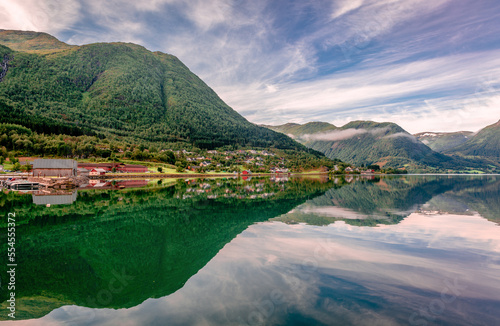 View of the village of Skei and lake Jolstravatnet, in Sunnfjord Municipality, Vestland county, Norway. Scenic landscape in the summer, reflections on the water. photo