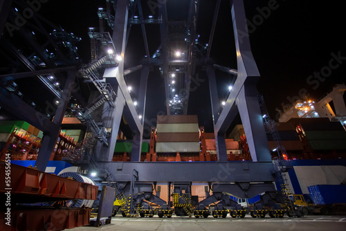 Containers loading by crane in the night , Trade Port. container operation in port series