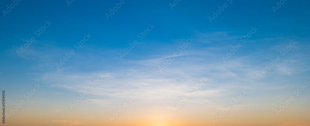 Morning sky scene with a bright golden light. Beautiful sunrise with clouds soft. Nature background concept