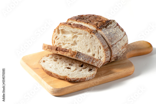 Sliced Sourdough Bread on wood board isolated on white background, homemade bakery